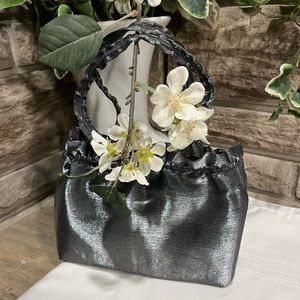 Vintage Gold co silver cinch handbag